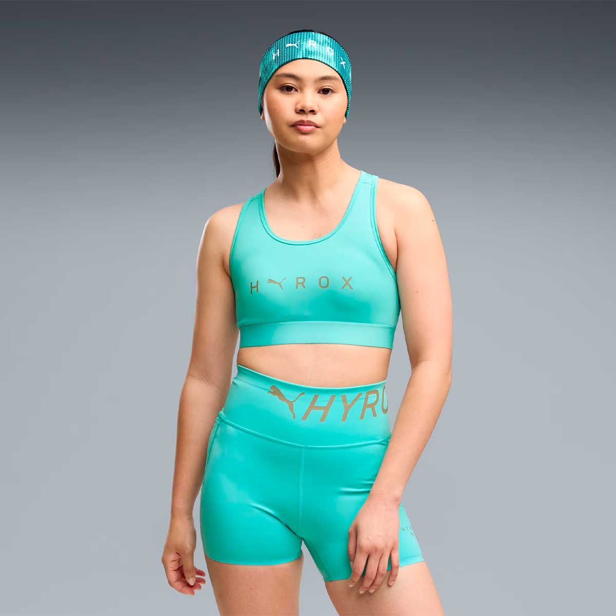 Top Deportivo Puma HYROX Mid Sports Bra Aqua Mujer