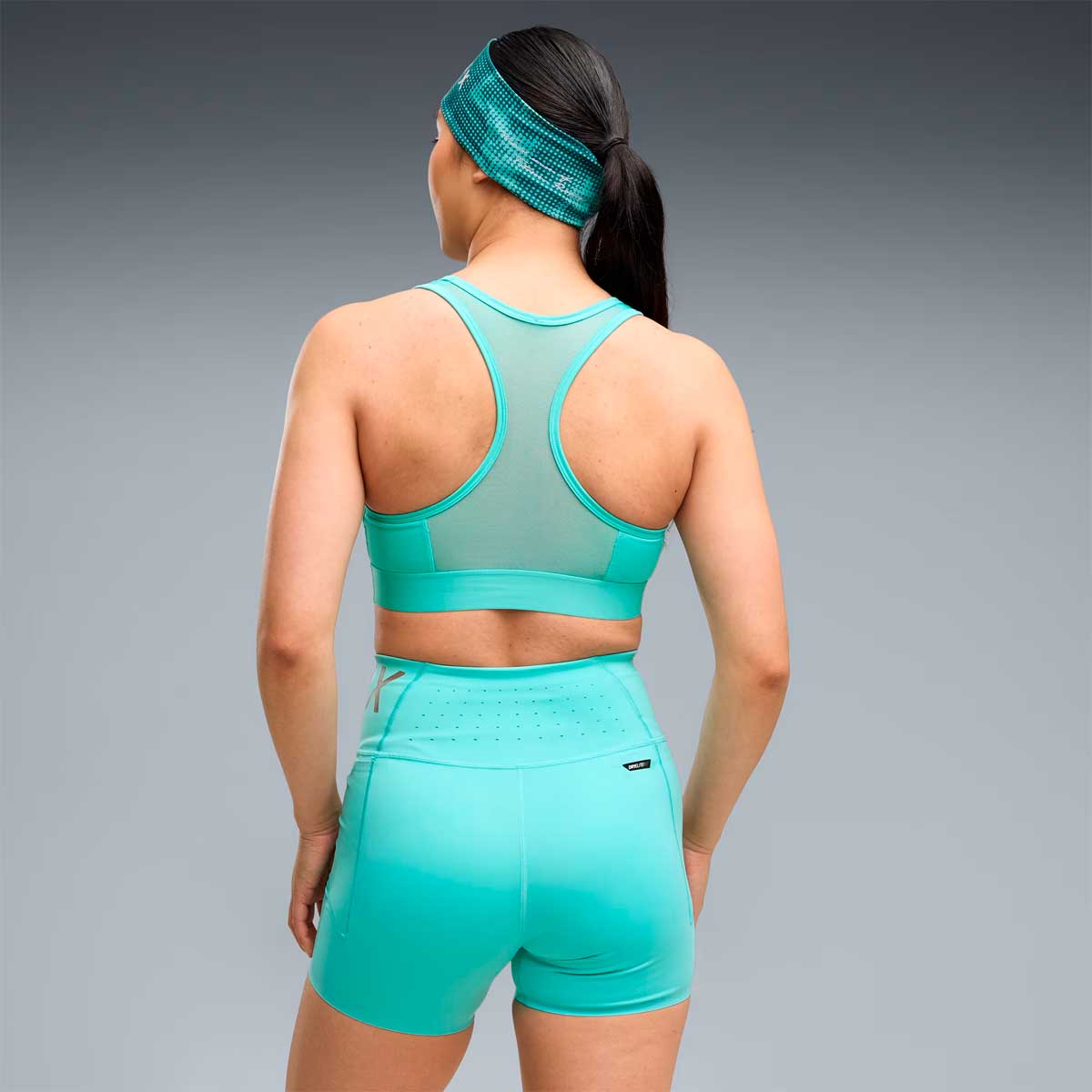 Top Deportivo Puma HYROX Mid Sports Bra Aqua Mujer