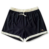 Conjunto Tracksmith Van Cortland Singlet and Shorts Negro Hombre