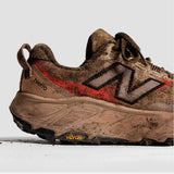 Tenis New Balance HIERRO V9 Marrón Negro Hombre