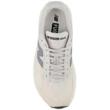 Tenis New Balance Running REBEL V5 Gris Beige Mujer