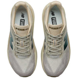 Tenis New Balance Running REBEL V5 Beige Café Mujer